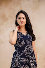 Elegant flare of the A-line black kurta with ivory floral linework – Midnight Floral Set by Tanauri.