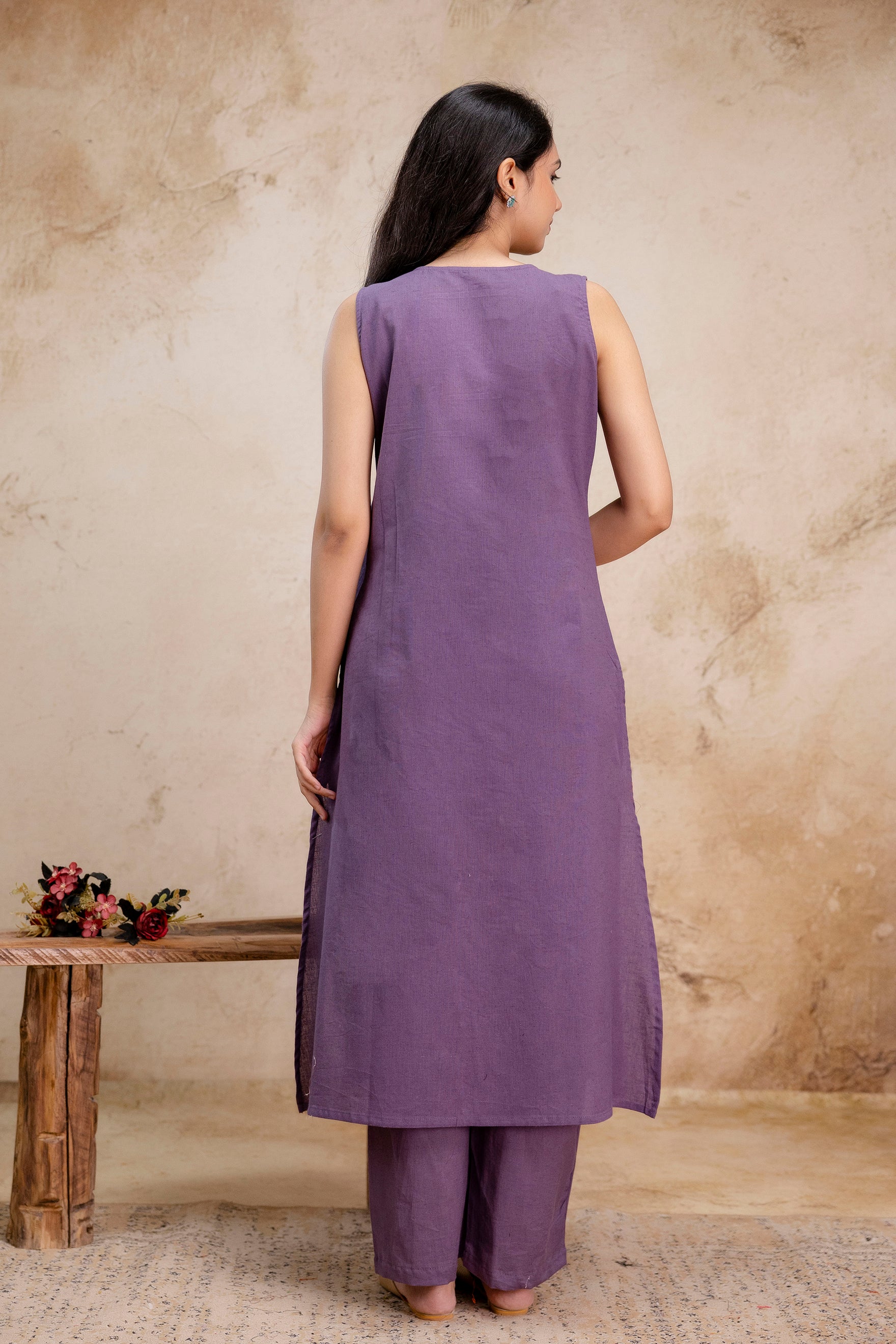 Tanauri Purple Embroidered Lotus Kurta Set – lavender A-line sleeveless kurta and straight pants in breathable cotton fabric.