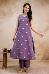 Purple Embroidered Lotus Kurta Set – sleeveless lavender cotton kurta with white lotus embroidery by Tanauri.