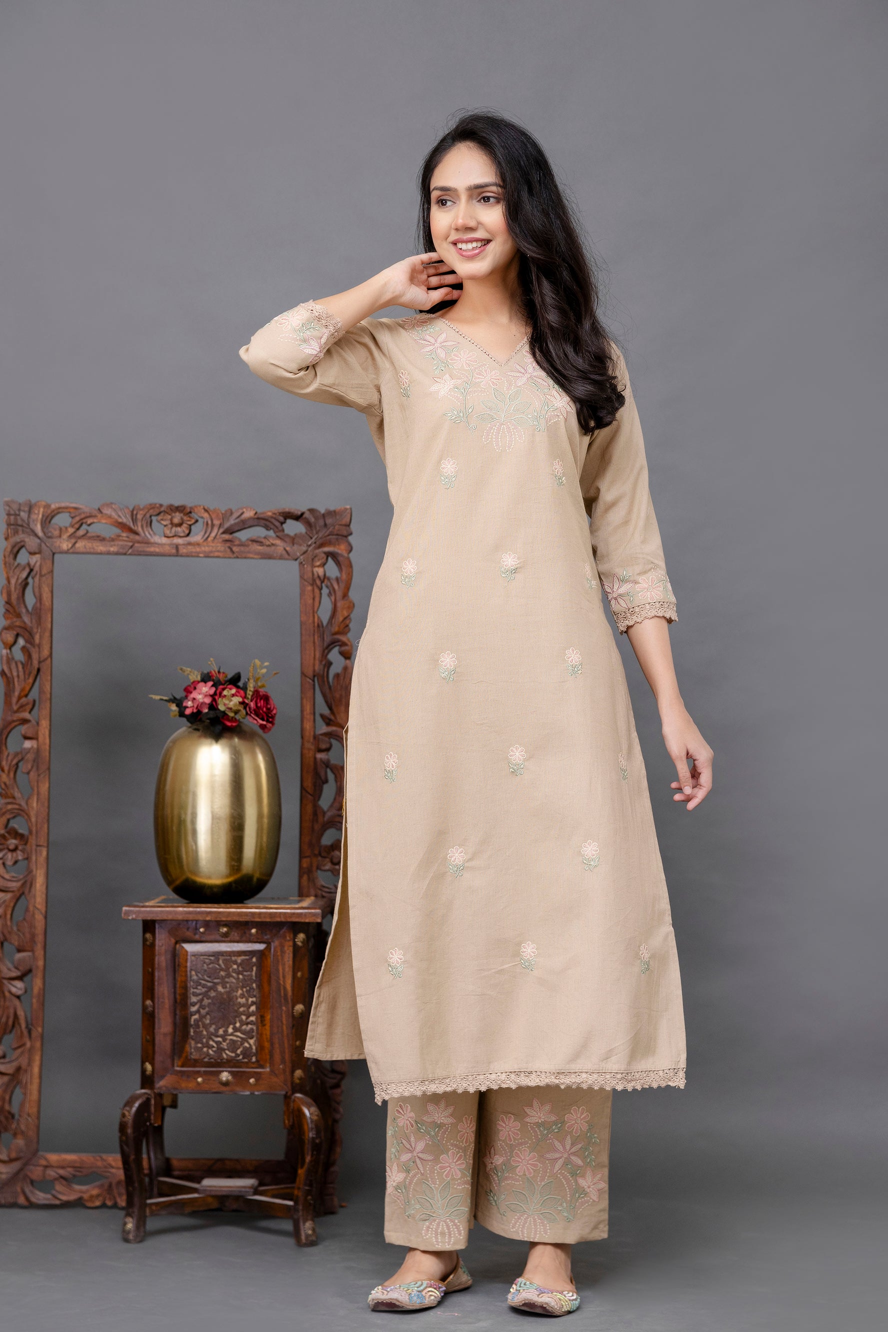 Beige-colored straight kurti with a subtle and elegant appearance

V-neckline highlighted with delicate thread embroidery

Intricate pastel floral embroidery on the chest and lightly scattered on the front panel

Elbow-length sleeves with detailed embroidered cuffs

Straight hem with soft lace border adding finesse

Made from breathable, lightweight cotton fabric – perfect for casual or semi-formal wear


