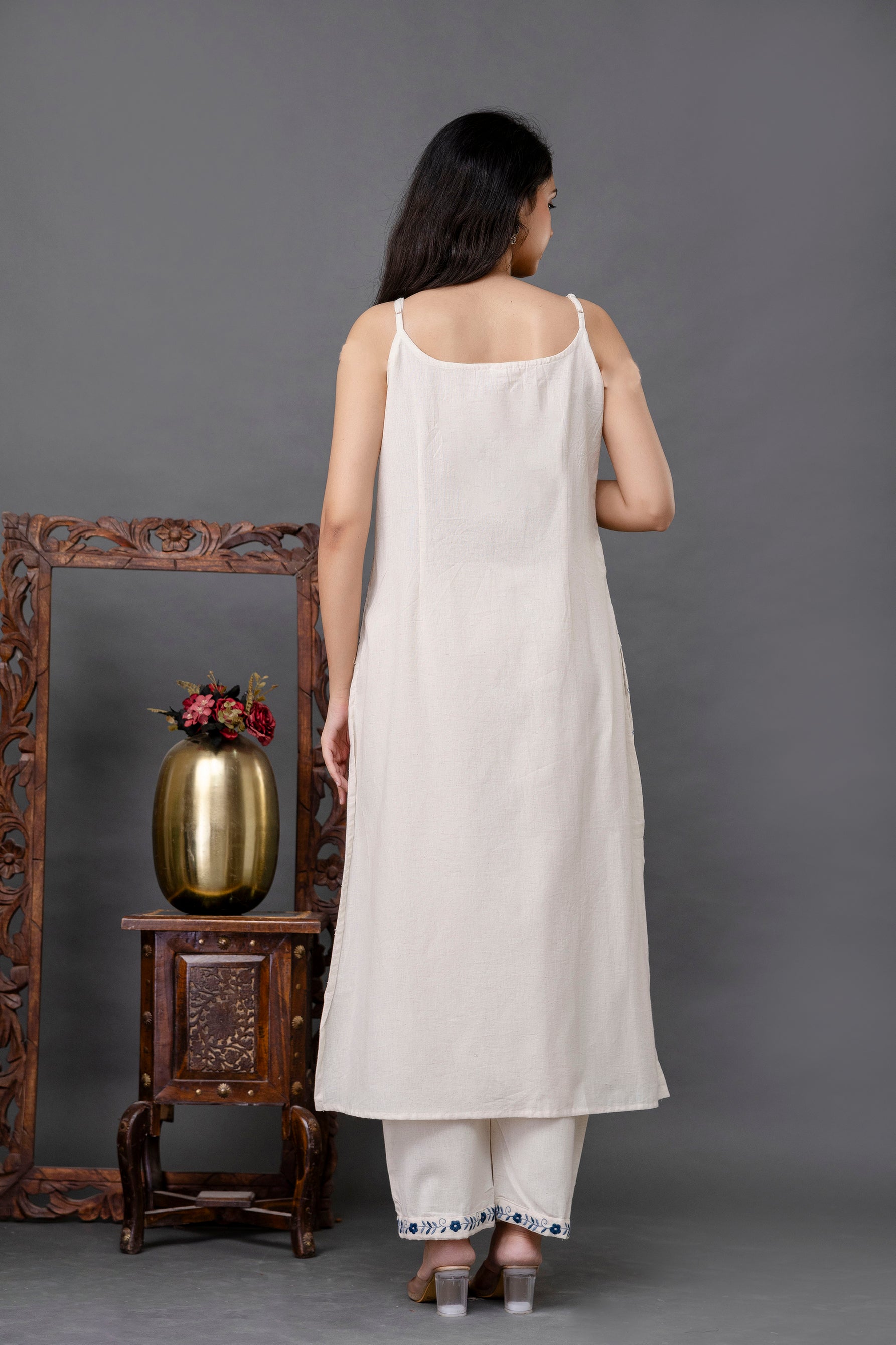 White Whimsy Embroidered Kurta Set – sleeveless white cotton kurta with blue floral embroidery by Tanauri.
