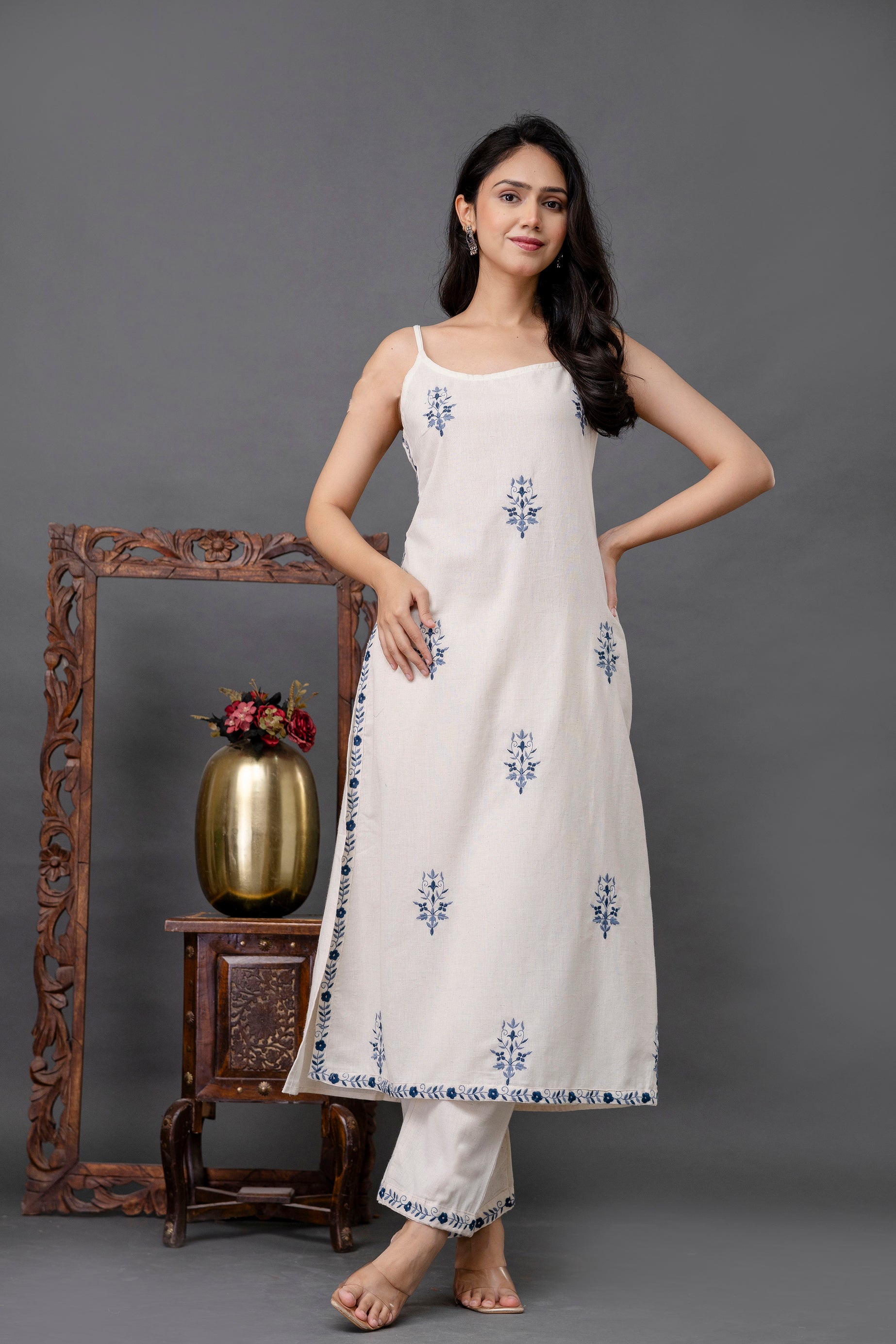 Hand-done blue floral embroidery on white cotton fabric – Tanauri White Whimsy Kurta Set.