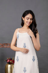 A-line sleeveless white cotton kurta with hand embroidery – White Whimsy Set by Tanauri.