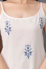 Tanauri White Whimsy Embroidered Kurta Set – sleeveless white cotton kurta and straight pants for summer wear.
