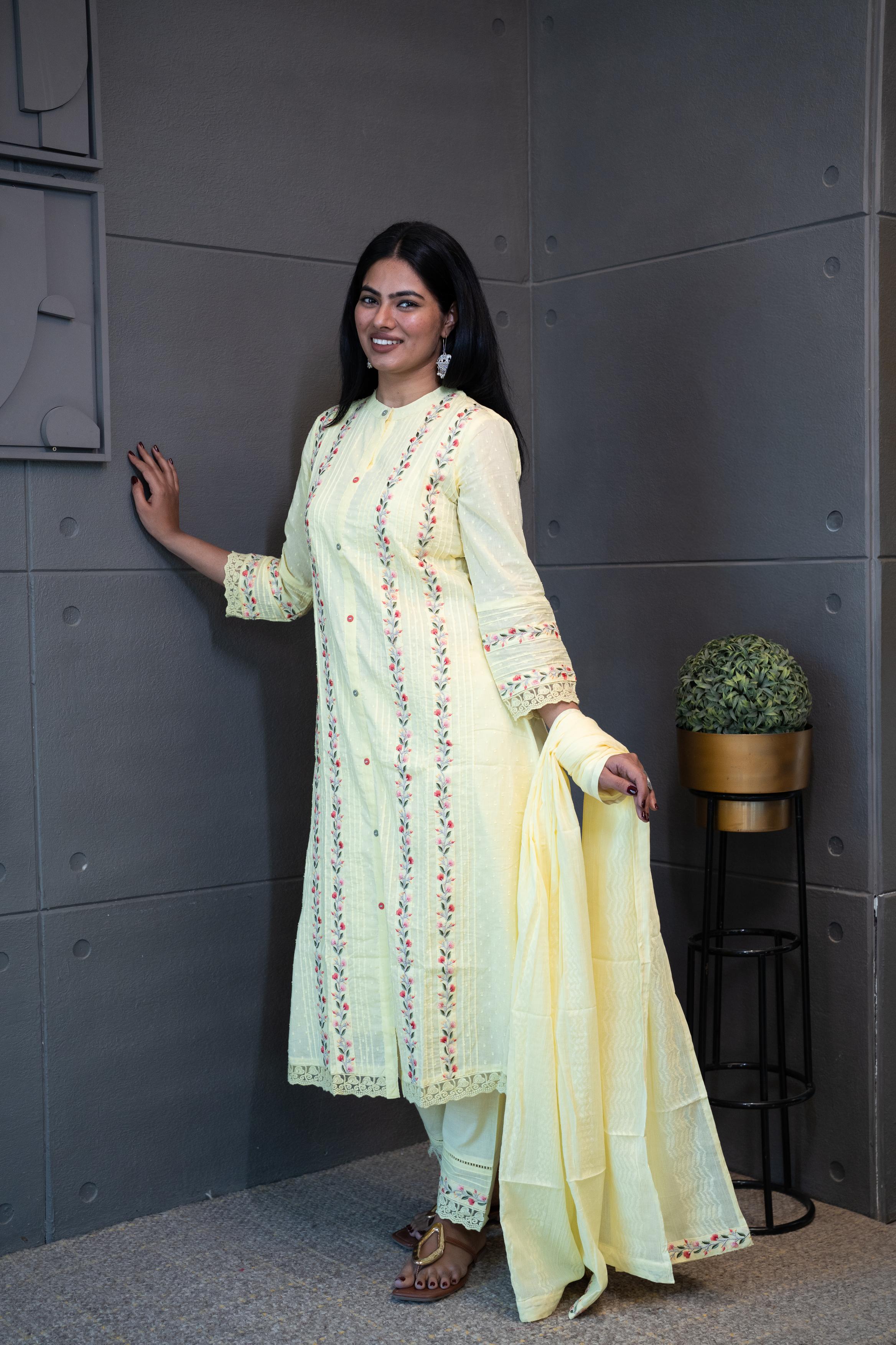 Sun Dew Set by Tanauri: Light yellow cotton three-piece suit with embroidered round neckline and matching textured dupatta