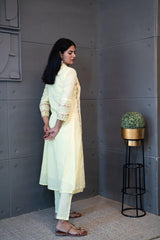 Tanauri Sun Dew Dupatta Set: Elegant light yellow cotton ethnic wear set with embroidered kurti and matching dupatta. Perfect Indian casual outfit
