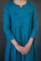 Blue Oasis Dupatta Set by Tanauri: Blue cotton three-piece suit with embroidered round neckline and matching textured dupatta