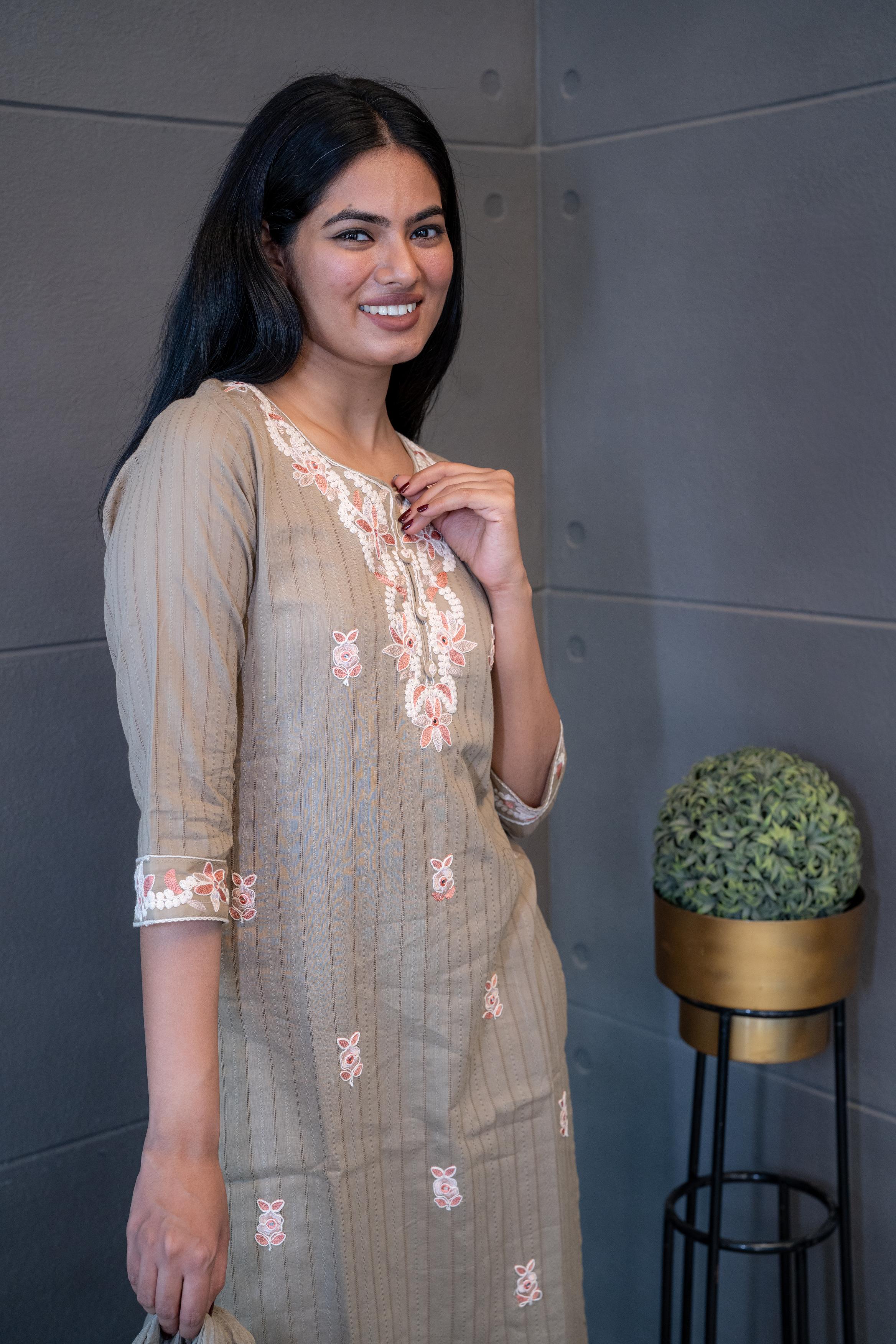 The Dusky Dupatta Set by Tanauri: Beige cotton kurti with delicate floral embroidery and matching textured dupatta.