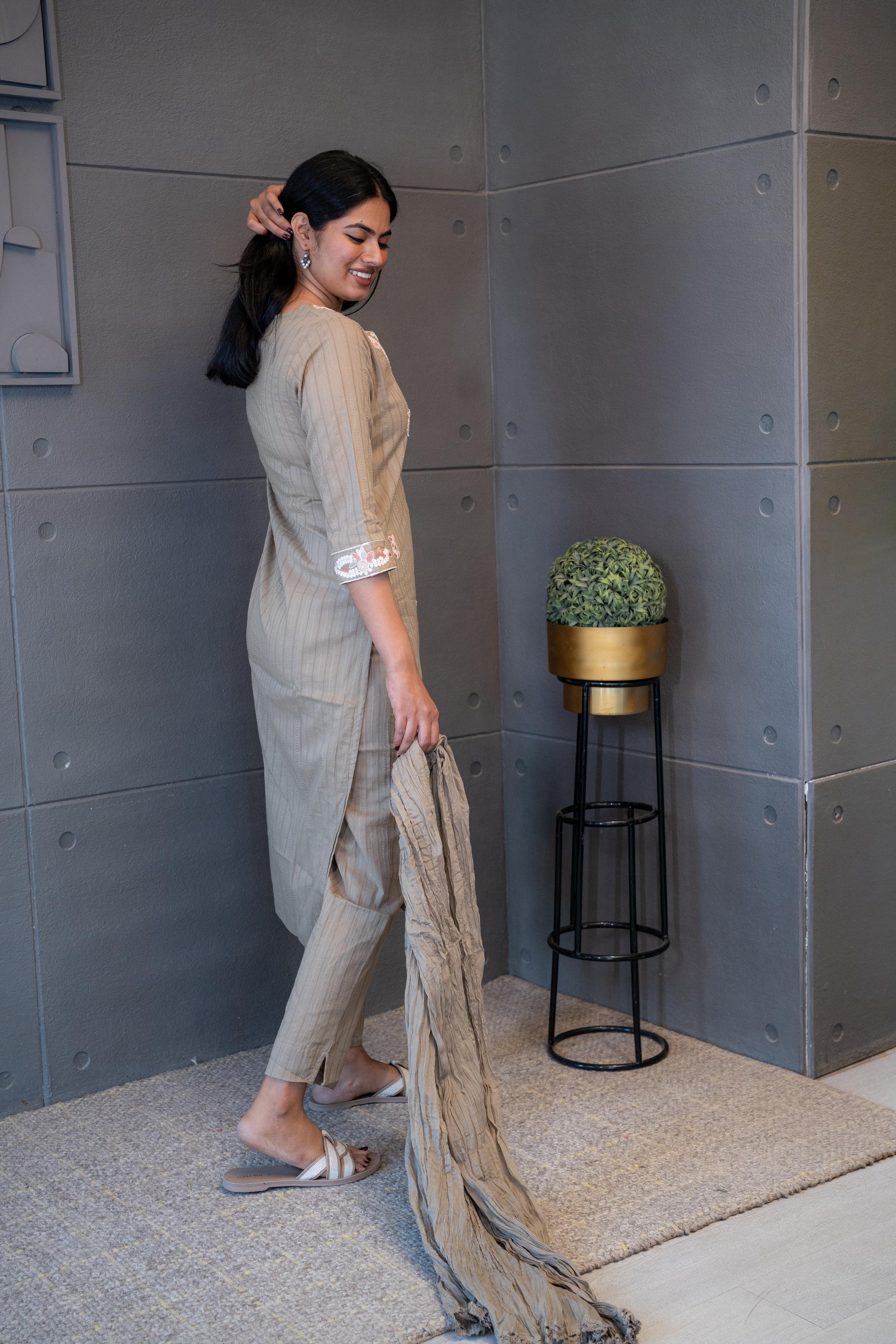 Tanauri Dusky Dupatta Set: Elegant beige cotton ethnic wear set with embroidered kurti and matching dupatta. Perfect for casual or festive Indian occasions.