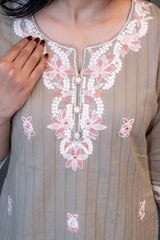 The Dusky Dupatta Set by Tanauri: Beige cotton kurti with delicate floral embroidery and matching textured dupatta.