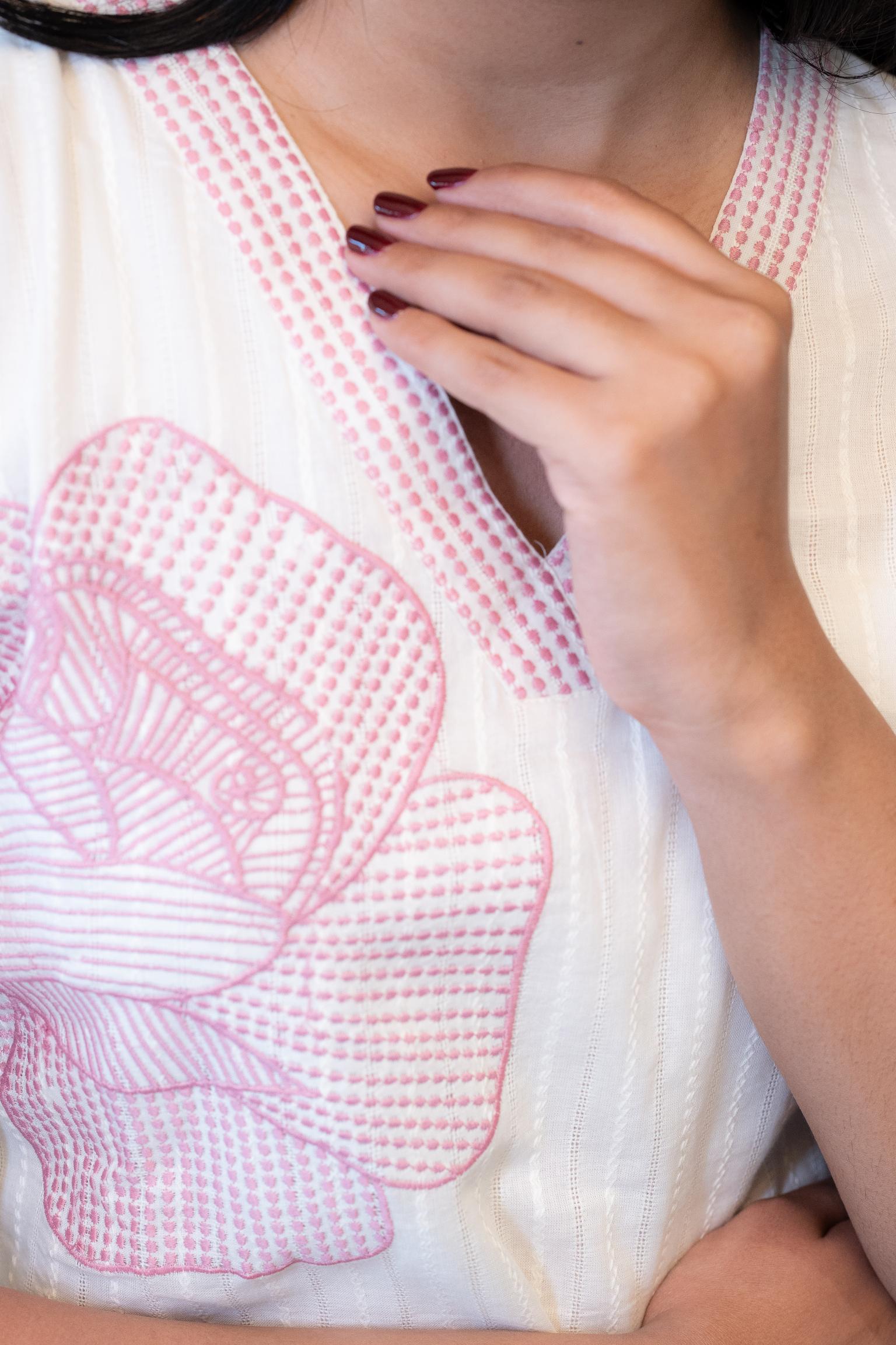 Pink Thread Kurta Set by Tanauri: White cotton two-piece suit with embroidered V-neckline