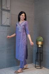 The Jamuni Kurta Set by Tanauri: Beige cotton two-piece suit with embroidered V-neckline and matching pant