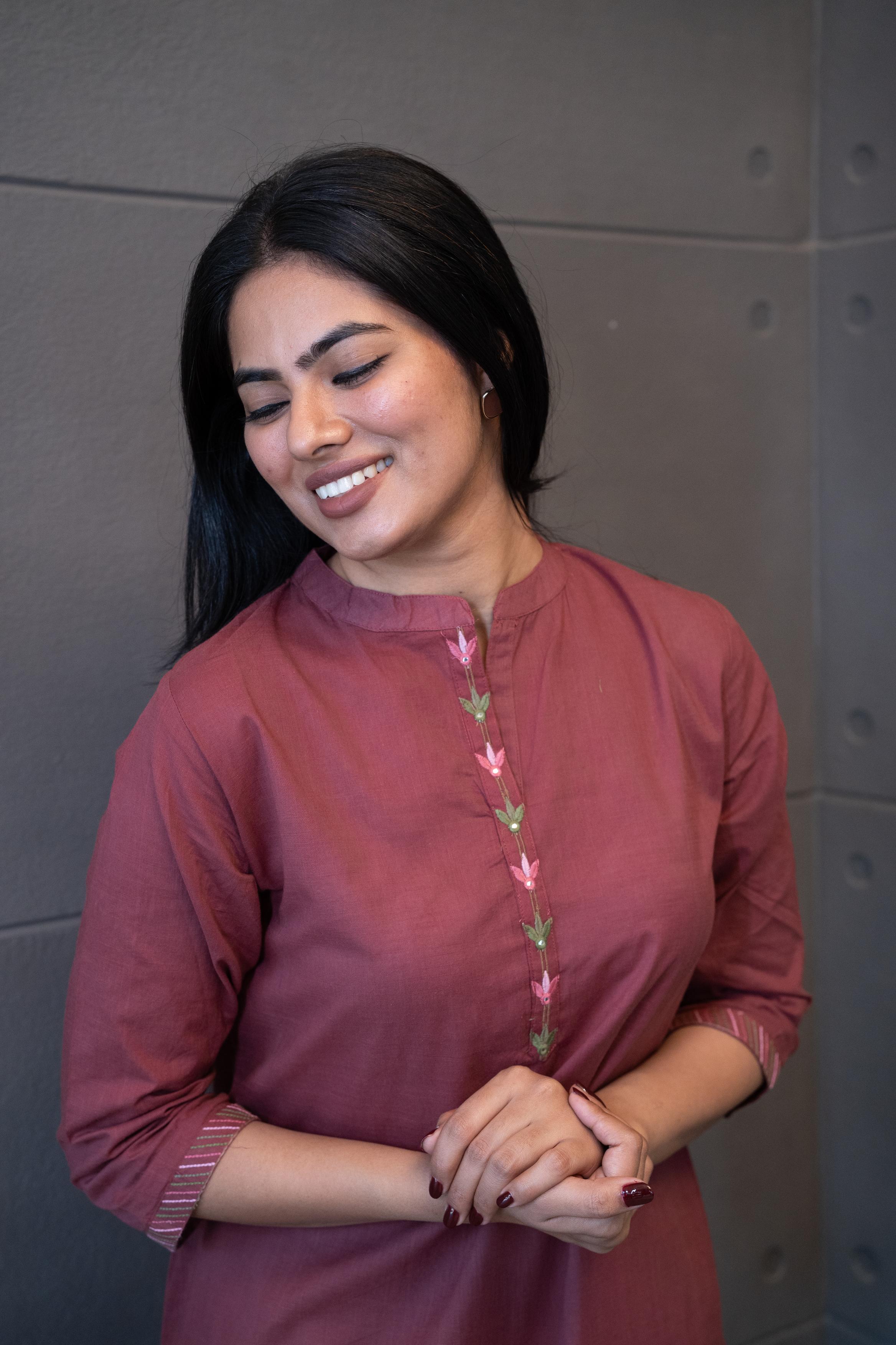 Model wearing Tanauri Mauve Deer Delight Kurta Set, showing full view of cotton kurti with floral embroidery and matching pants