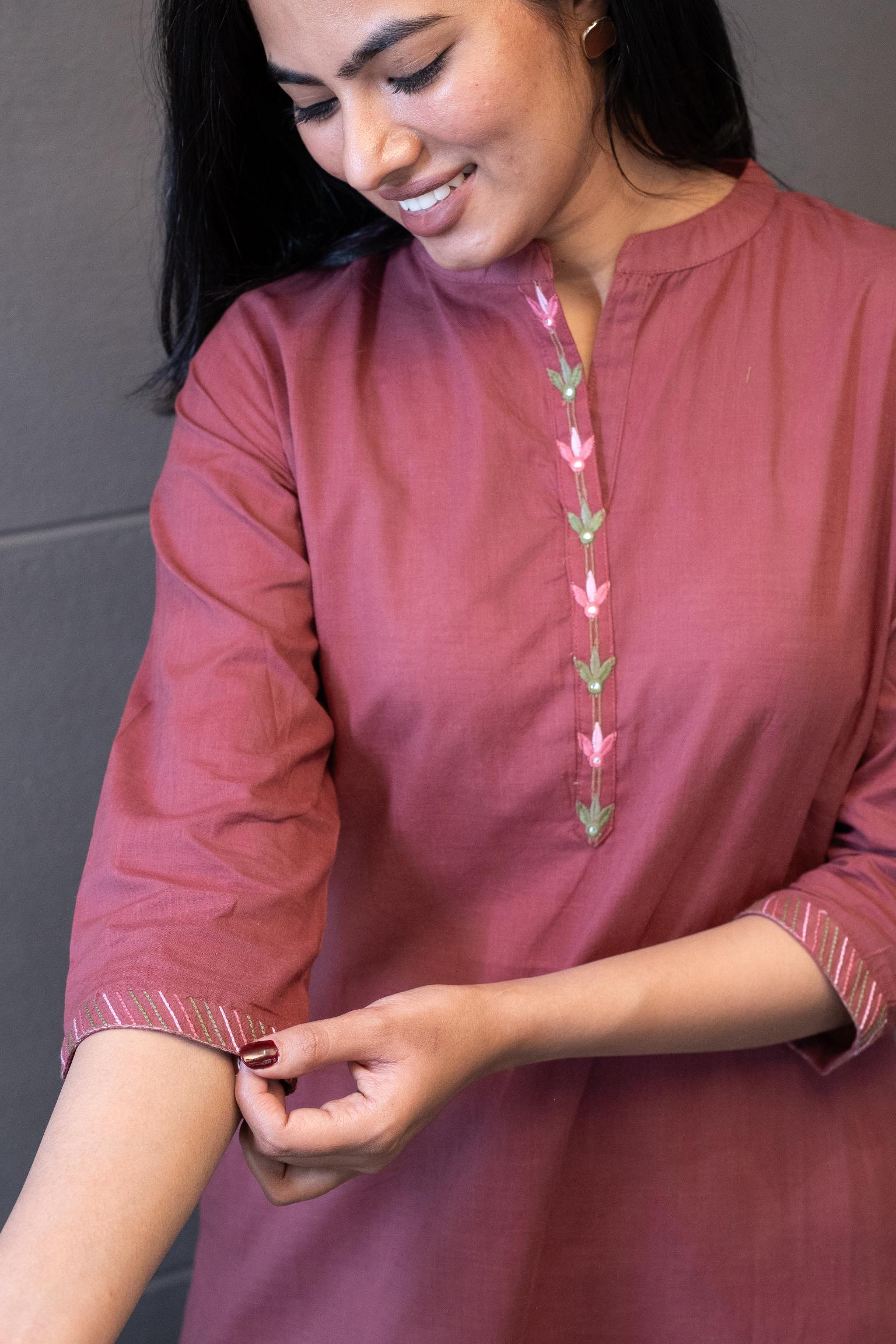 Model wearing Tanauri Mauve Deer Delight Kurta Set, showing full view of cotton kurti with floral embroidery and matching pants
