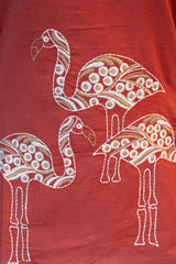 Close-up of the V-neckline of the Tanauri Mastani Short Kurti/Top, highlighting the bold white vertical stripe embroidery/detailing against the brick red fabric