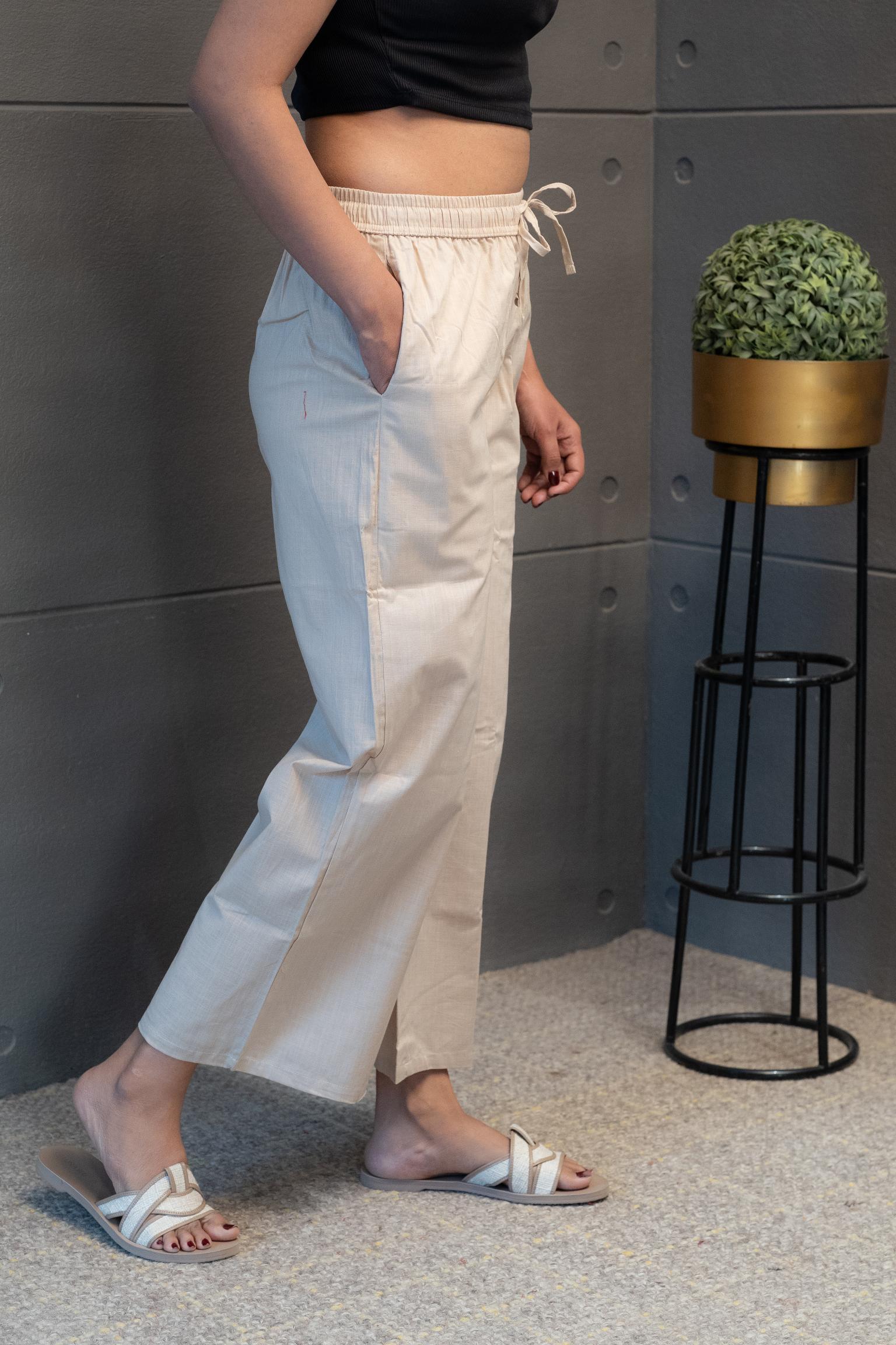 Women’s beige drawstring pants with pockets