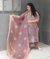 Back design of mauve Nayab cotton kurta set with floral prints and matching dupatta.