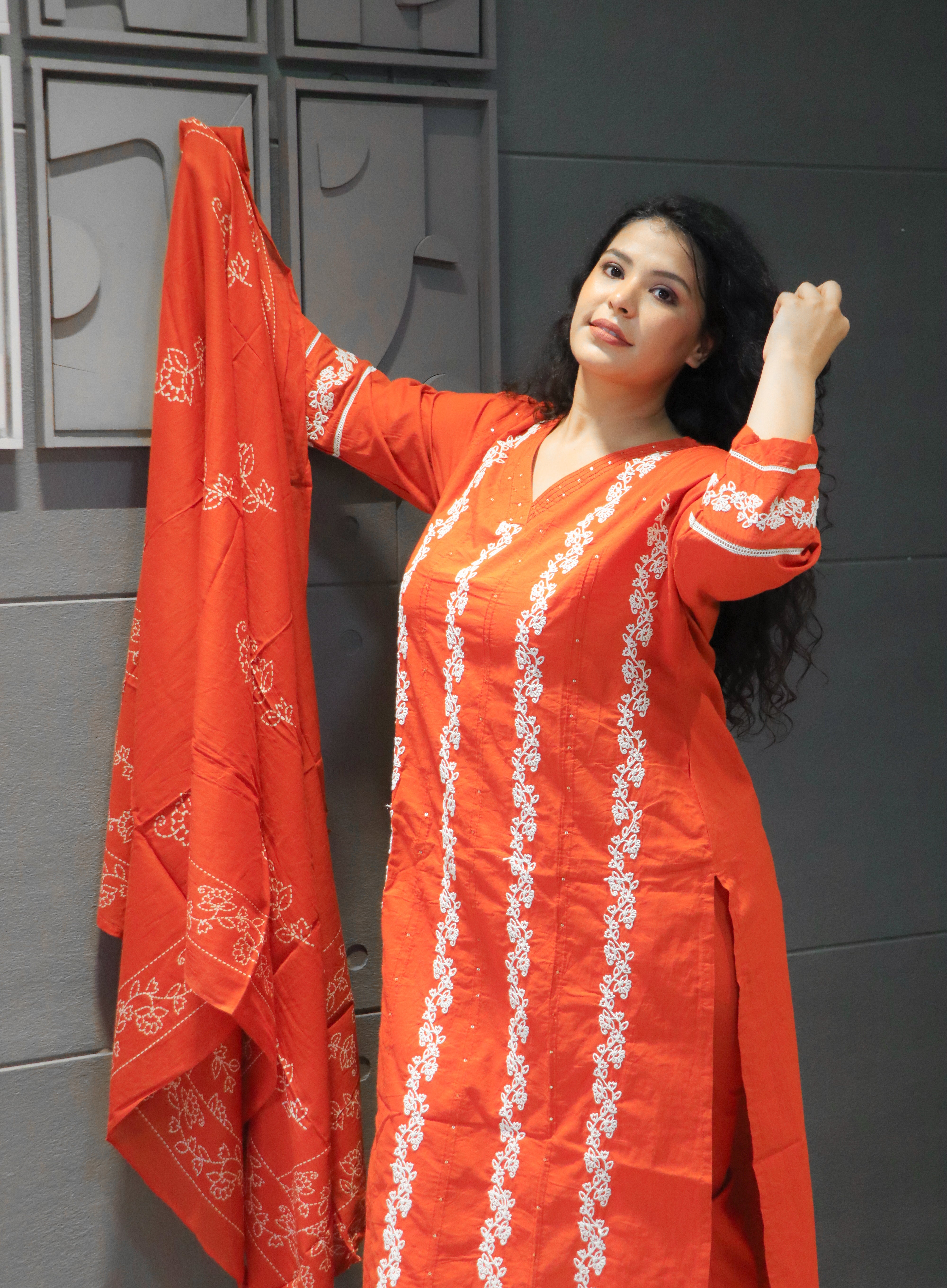 Back design of orange cotton kurta with white embroidered detailing – Kesariya Dupatta Set.