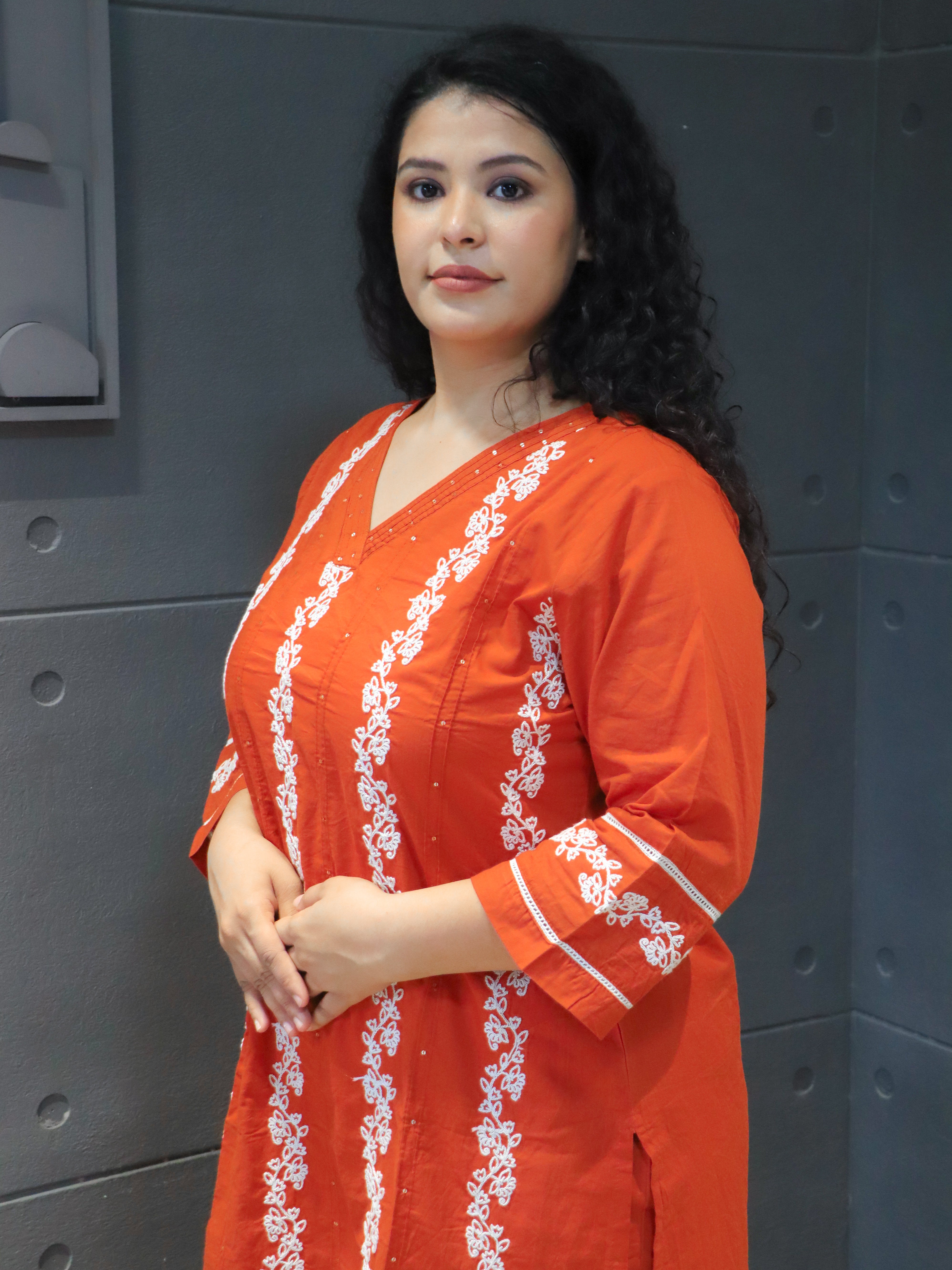Back design of orange cotton kurta with white embroidered detailing – Kesariya Dupatta Set.