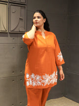 Soft rust orange cotton fabric with elegant thread embroidery – Tanauri Co-Ord Set.