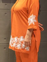 Back design of rust orange embroidered cotton co-ord set – Aarangee by Tanauri.