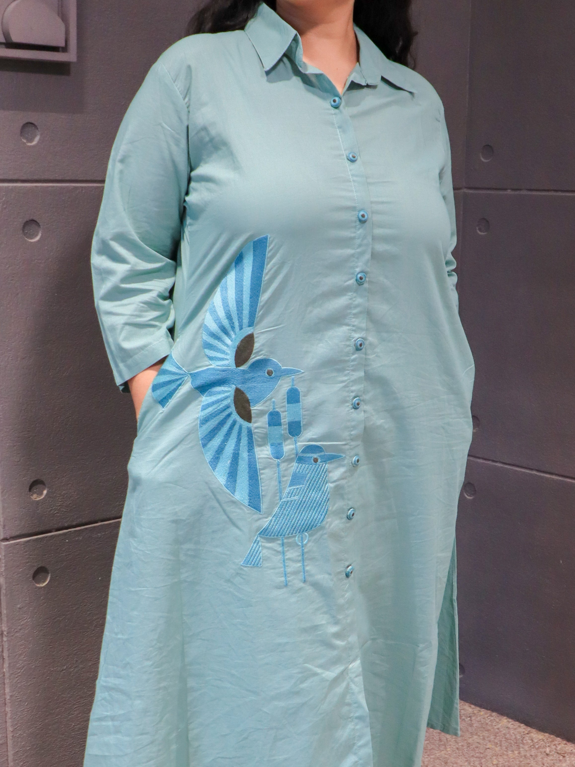 Intricate bird embroidery on mint green cotton fabric – Tanauri Aquateel Kurta Set.