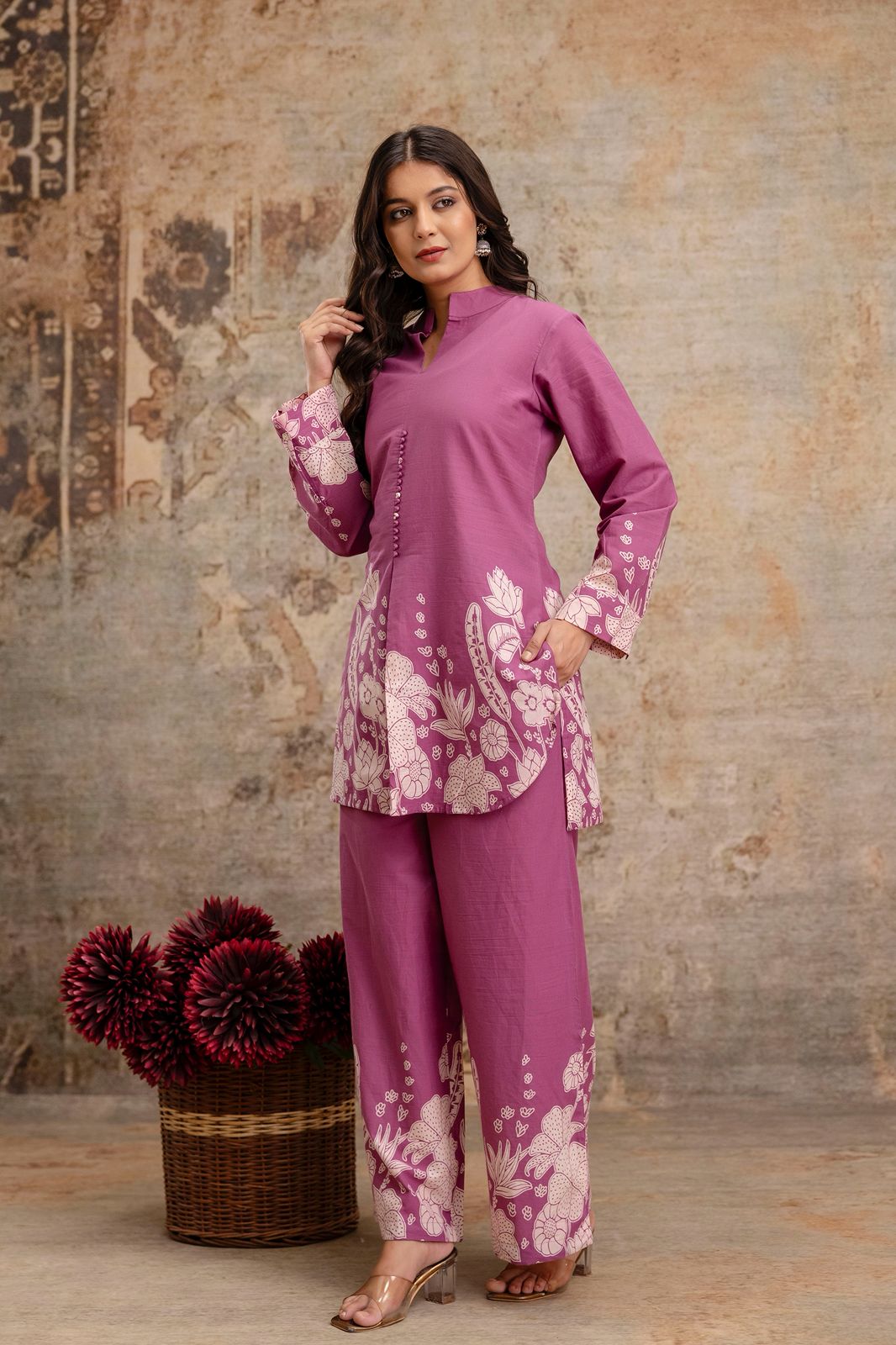 1. Mauve floral printed co-ord set with front-slit kurti and straight pants  
2. Full-length mauve kurti set with ethnic white print – model standing  
3. Pure cotton mauve co-ord set for women with printed hem and sleeves  
4. Mauve ethnic kurti and pant set with floral white motifs – front pose  
5. Model wearing mauve kurti set with handcrafted button placket  
6. Comfortable cotton kurti and trouser set in mauve – front view  
7. Ethnic wear mauve co-ord set with printed cuffs and ankle detailing  
