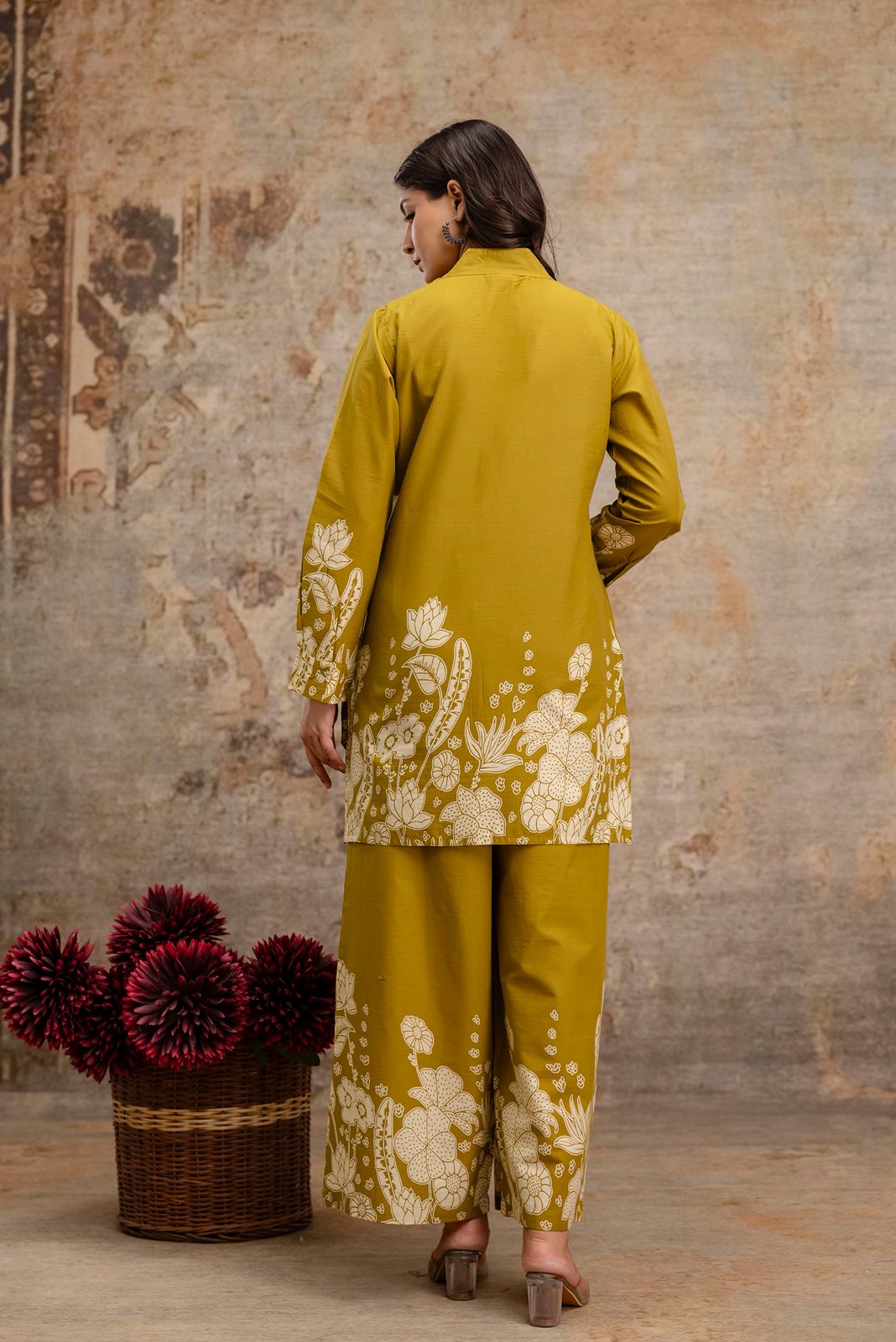 1. Back view of mustard cotton co-ord set with white floral block print  
2. Mustard ethnic kurti and pant set with floral detailing – rear angle  
3. Rear image of mustard yellow kurti set for women – printed design  
4. Back side of mustard co-ord set with long kurti and wide-leg pants  
5. Mustard kurti set with white block print on back and sleeves – ethnic wear  
6. Elegant back view of mustard floral kurti and pant outfit in cotton  
7. Traditional mustard two-piece set for women – block-printed rear 