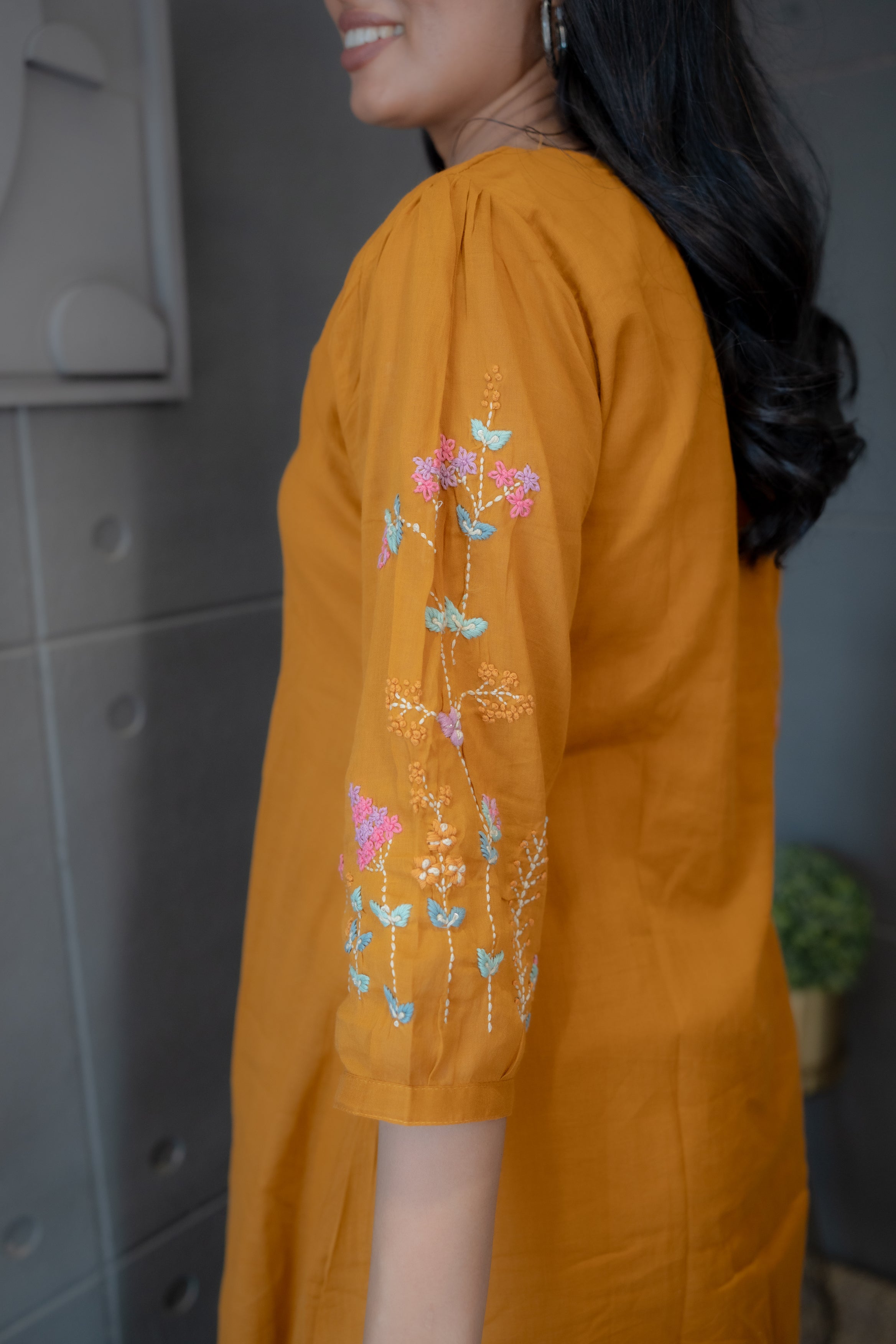 Embroidered Yellow Mul Cotton Kurta with Floral Detailing